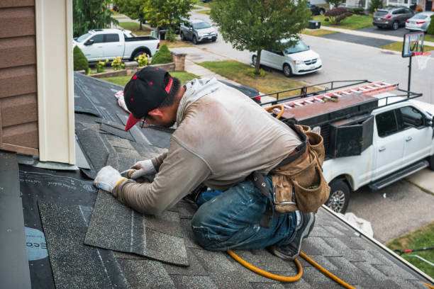 Professional Roofing technician working in Mecklenburg, NY